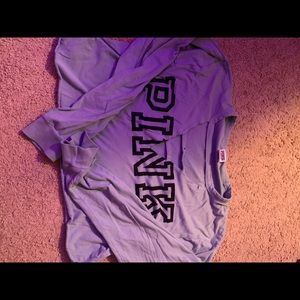 A cropped blue shirt brand pink and size is L